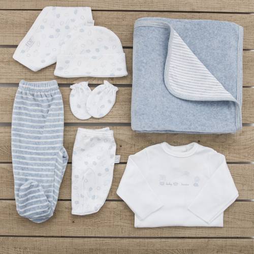 Pack recién nacido con primera puesta, gorrito, bandana, manoplas estampadas con ovejas de color azul y pantalón y arrullo