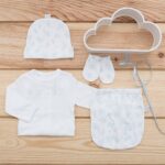 Pack recién nacido de primera puesta de bebé compuesta de camiseta con ranita con caracoles de color azul estampado con gorrito